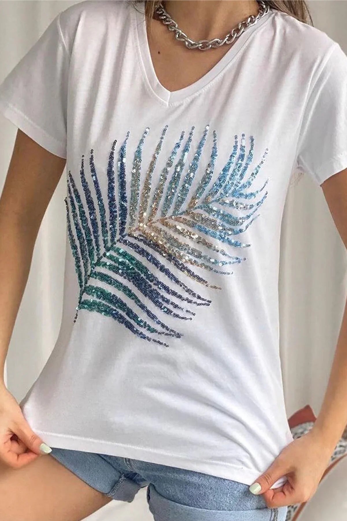 Katoenen T-shirt met pailletten en palmbladeren