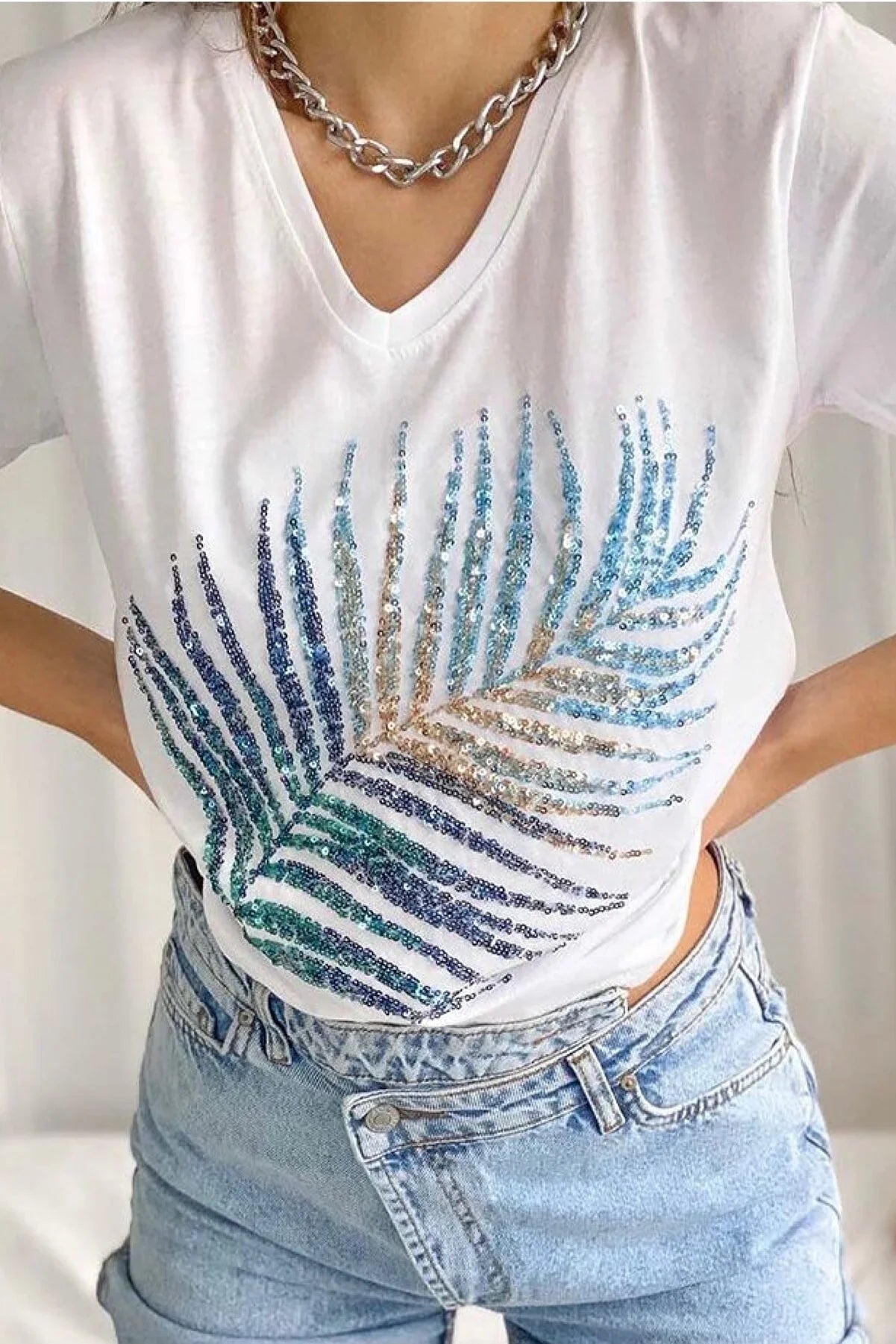 Katoenen T-shirt met pailletten en palmbladeren