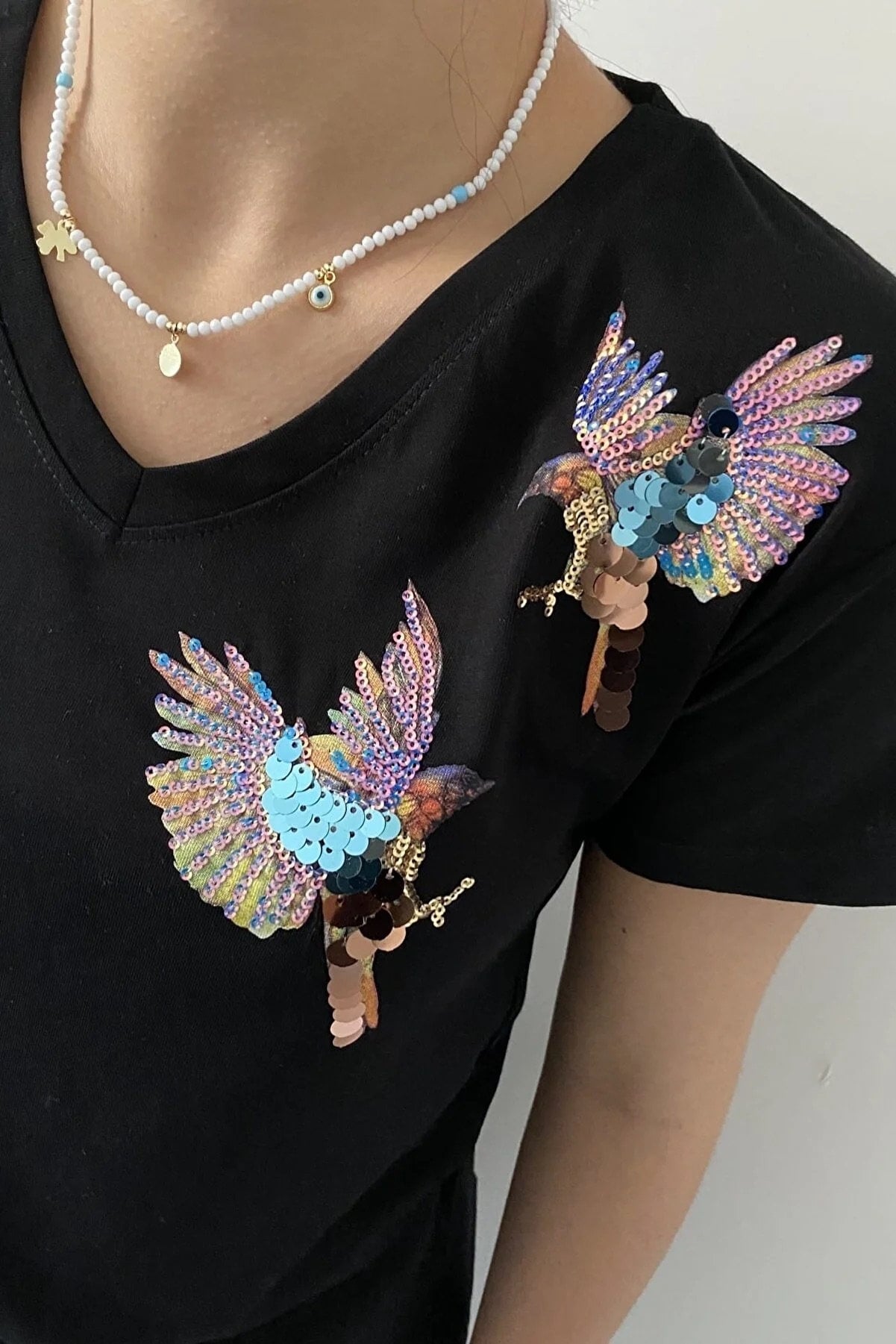 Katoenen T-shirt met korte mouwen en geborduurde vogel - Zwart