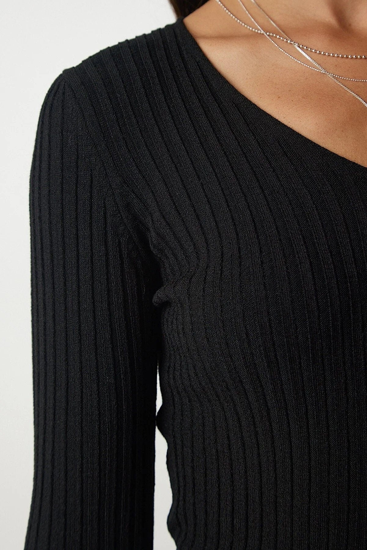 Strakke V-hals geribbelde blouse