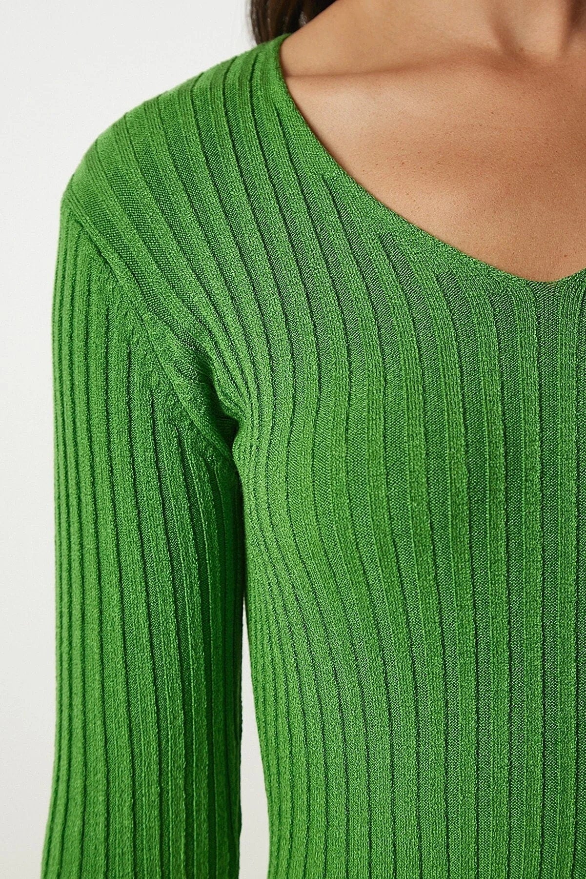 Strakke V-hals geribbelde blouse