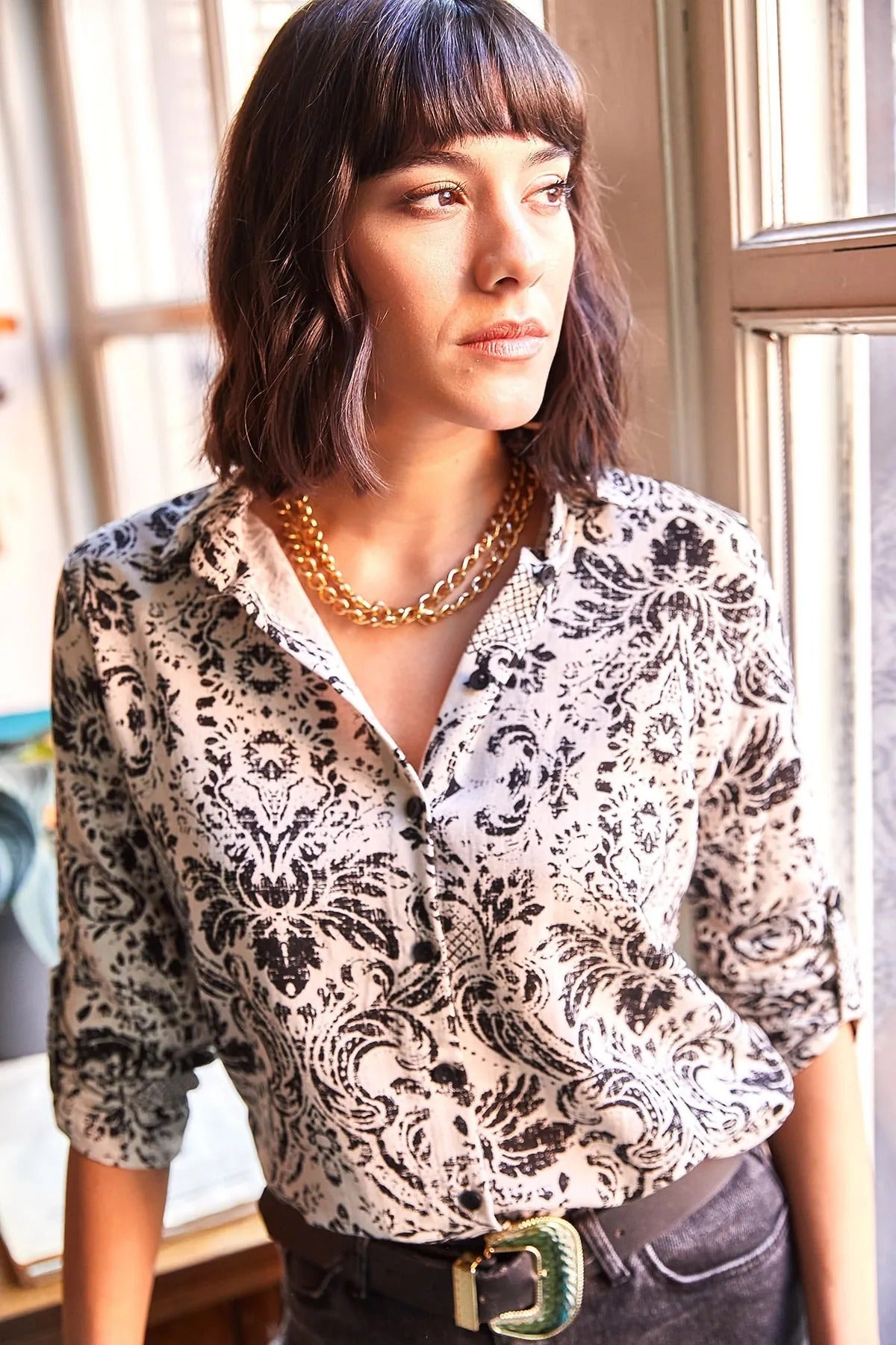 Zwarte bloemendesigner blouse met knoopjes