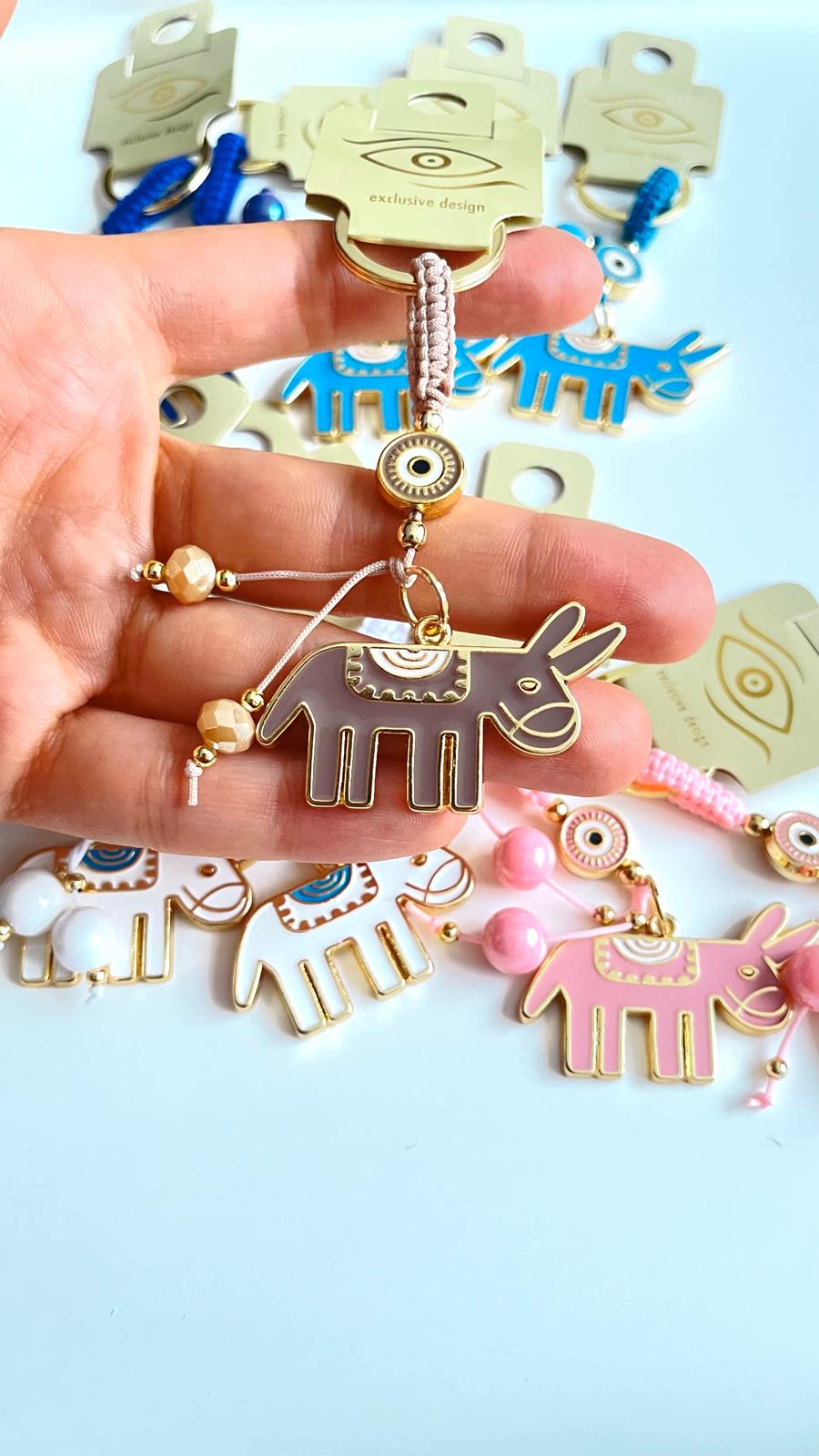 Beige Donkey Design Gold Evil Eye Keychain