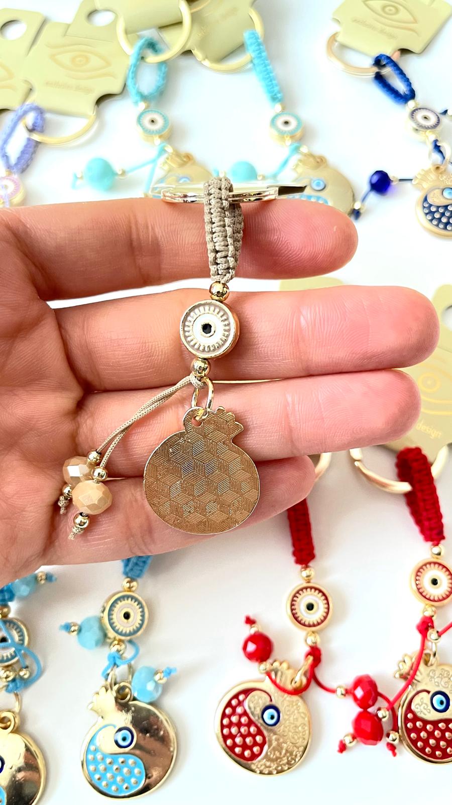 Beige Pomegranate Abundance Design Gold Evil Eye Keychain