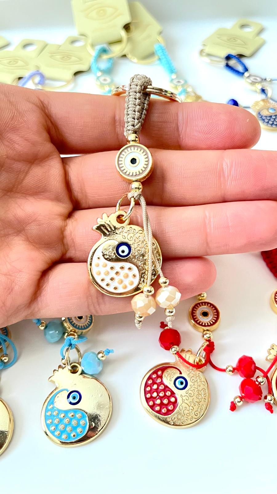 Beige Pomegranate Abundance Design Gold Evil Eye Keychain