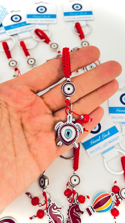 Llavero de plata con ojo de tortuga y diseño de ojo turco