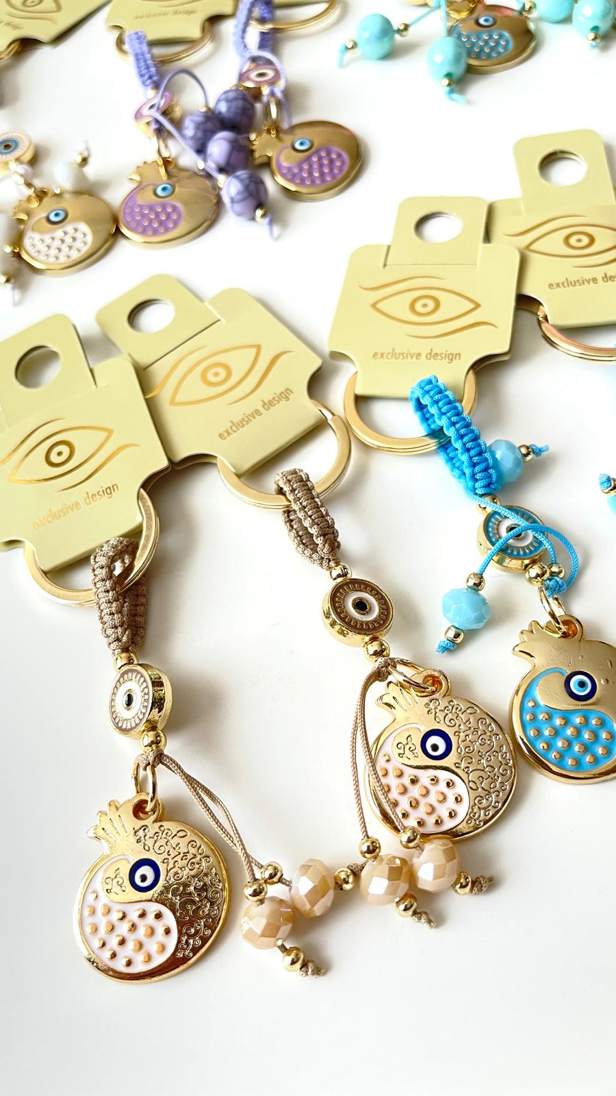 Beige Pomegranate Abundance Design Gold Evil Eye Keychain