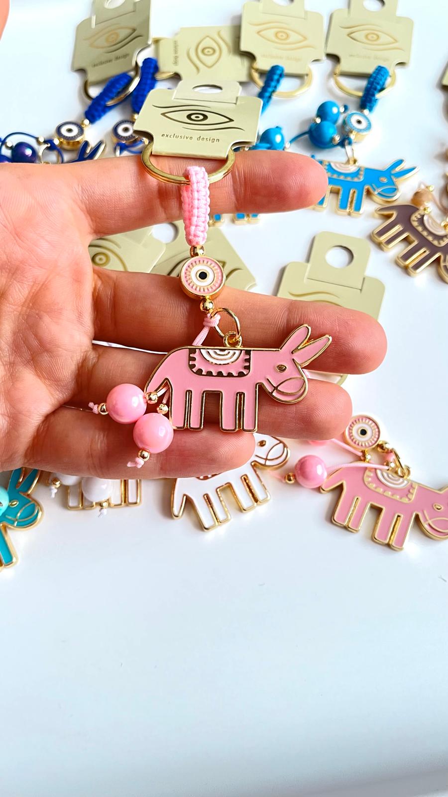Pink Donkey Design Gold Evil Eye Keychain