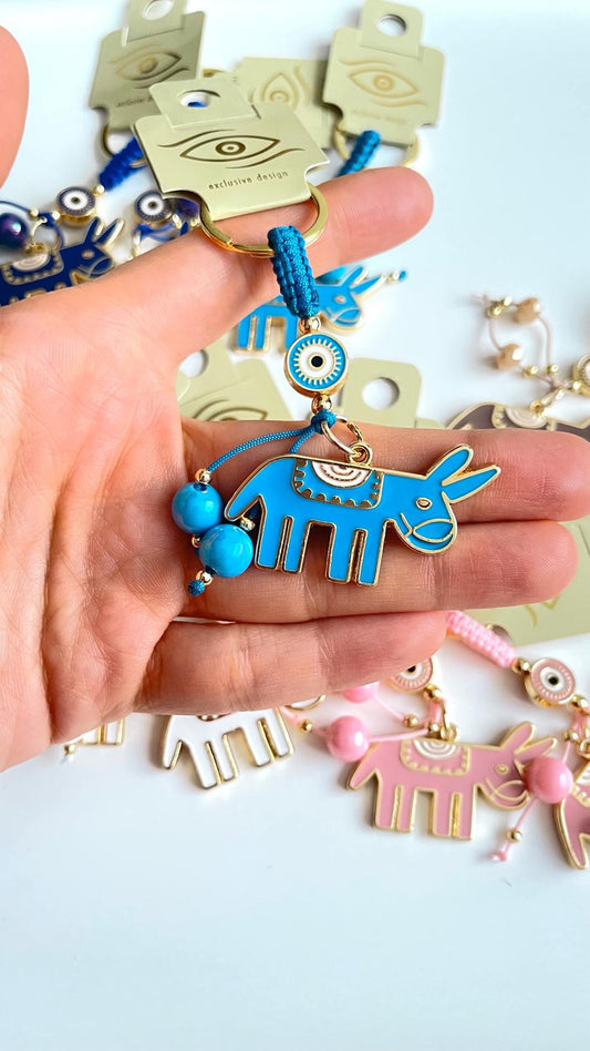Llavero con ojo turco dorado de Blue Donkey Design