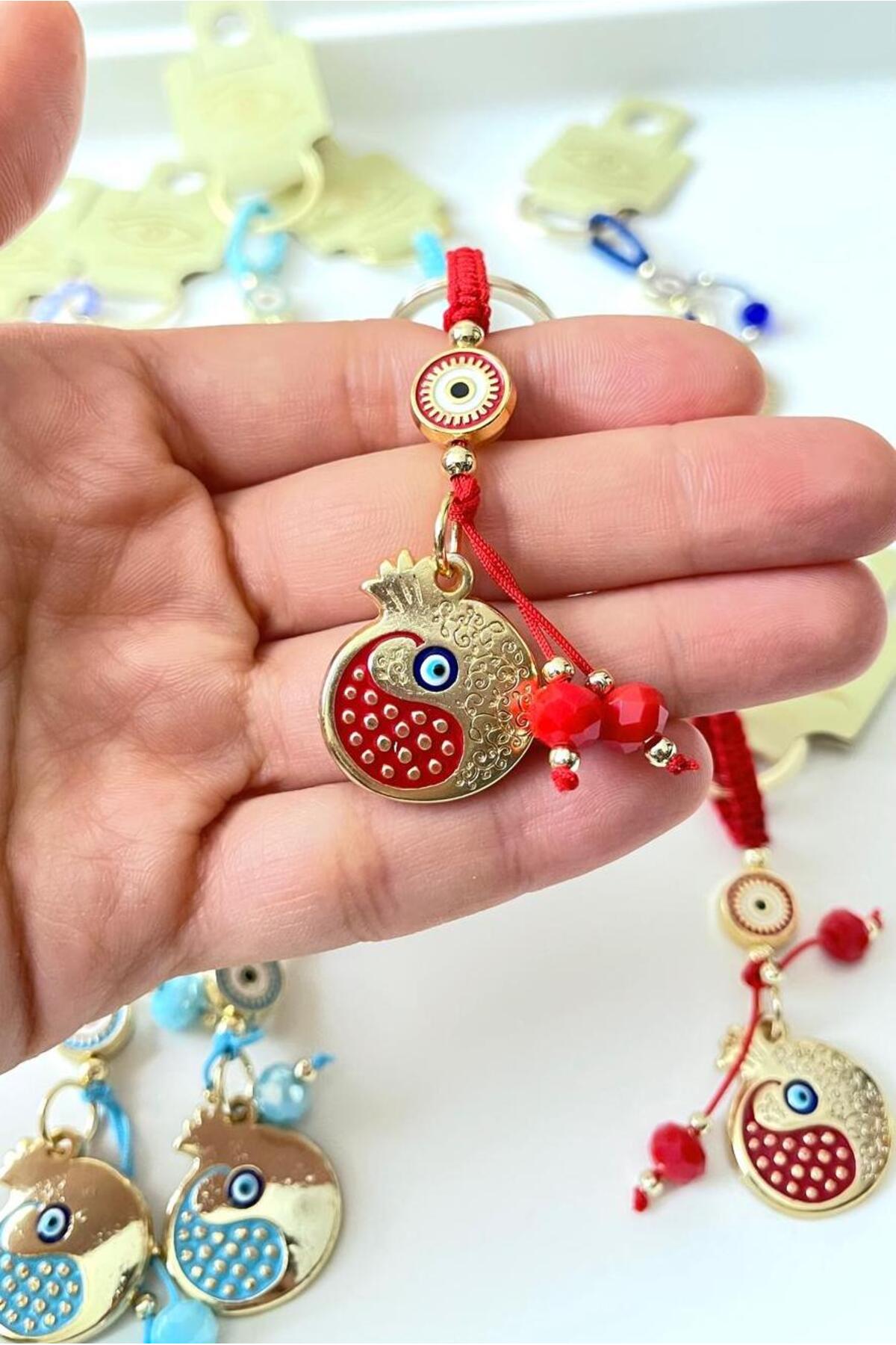 Bella Gold-Plated Animal Charm Keychain - Red Pomegranate Design