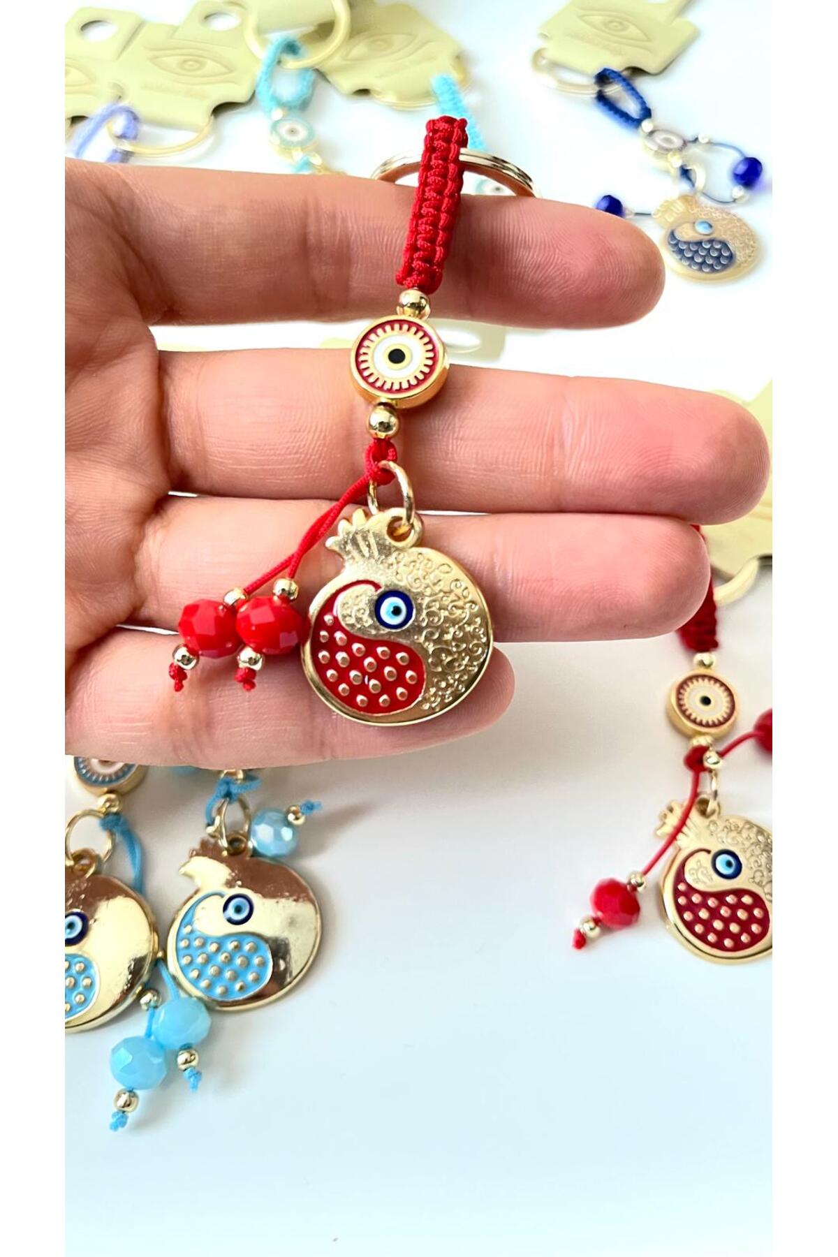 Bella Gold-Plated Animal Charm Keychain - Red Pomegranate Design