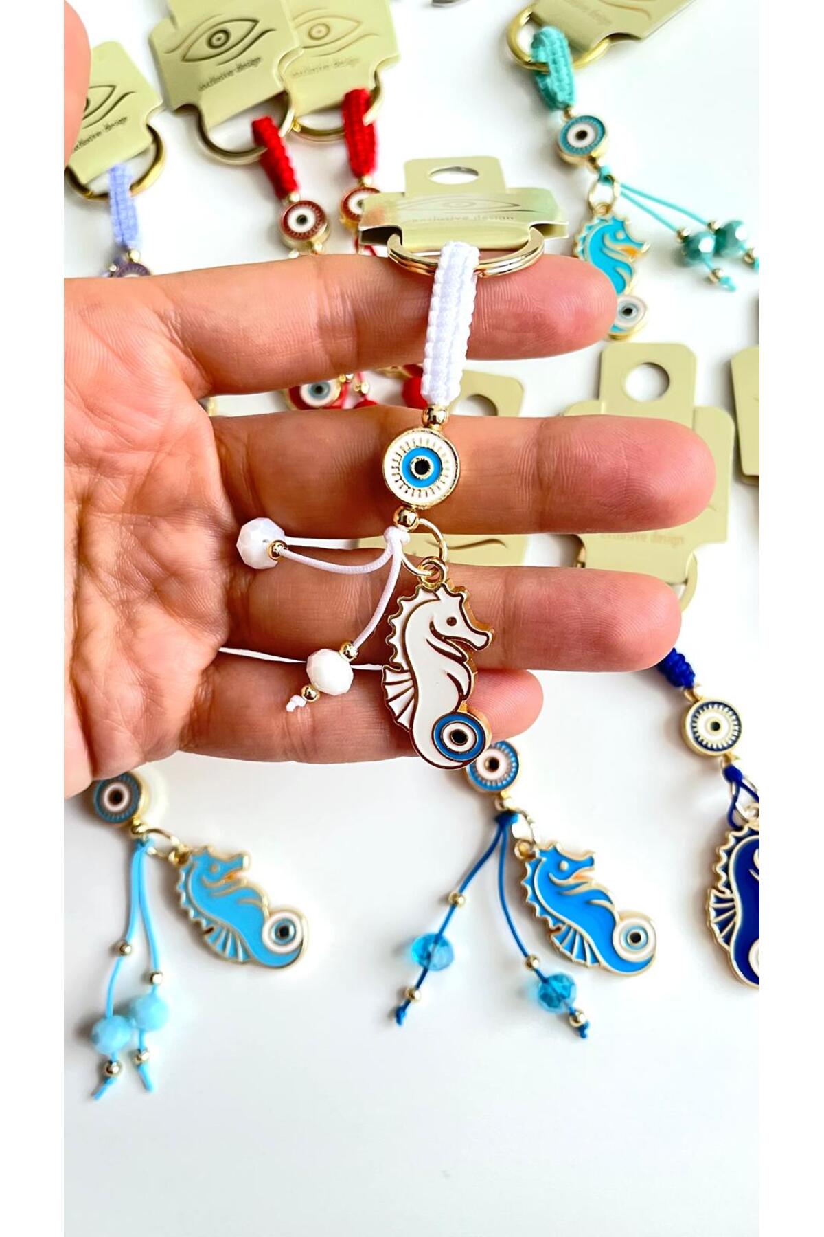 Ivy Gold-Plated Evil Eye Keychain - White Seahorse Design