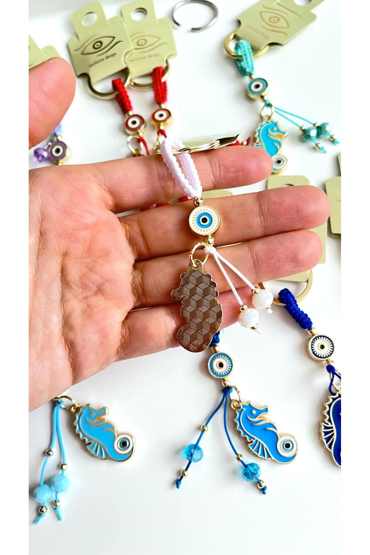 Ivy Gold-Plated Evil Eye Keychain - White Seahorse Design