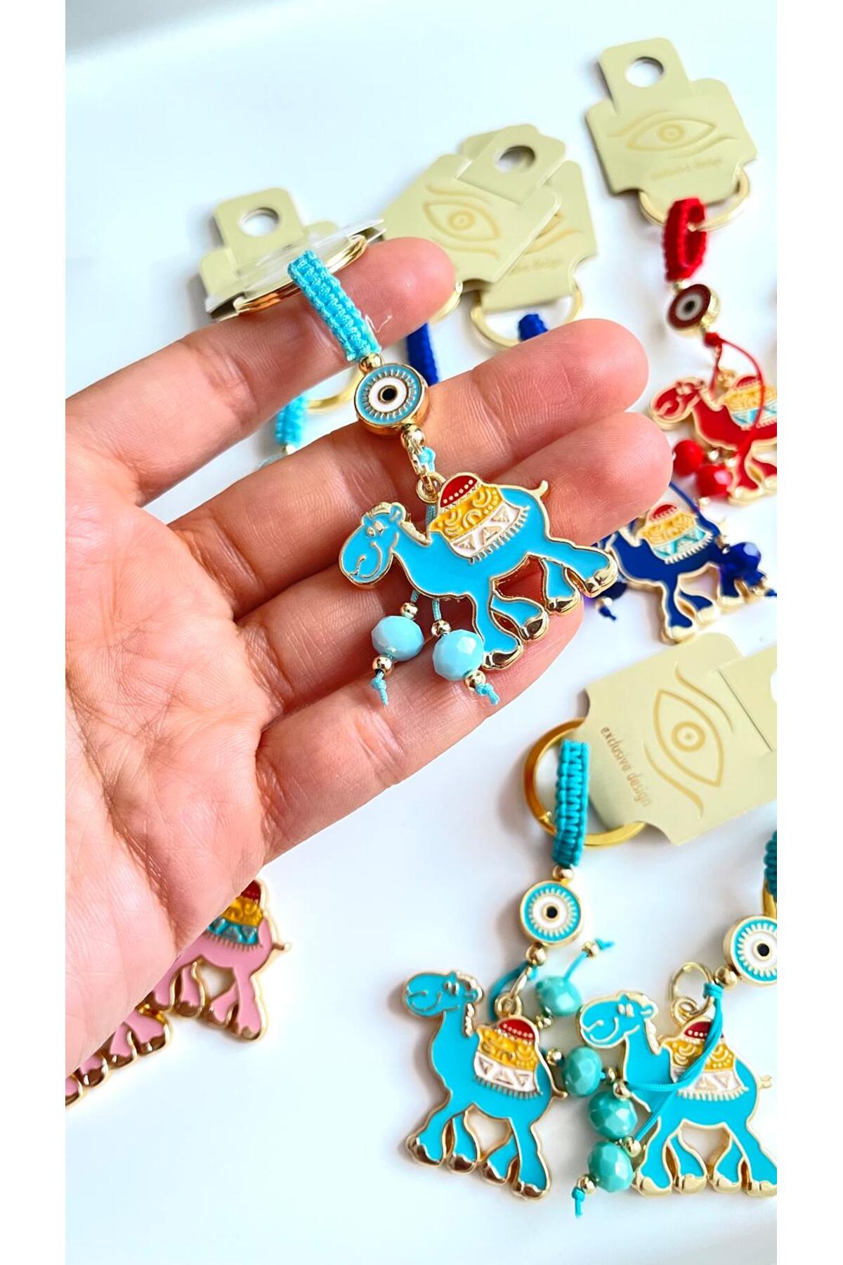 Bella Gold-Plated Animal Charm Keychain - Blue Camel Design