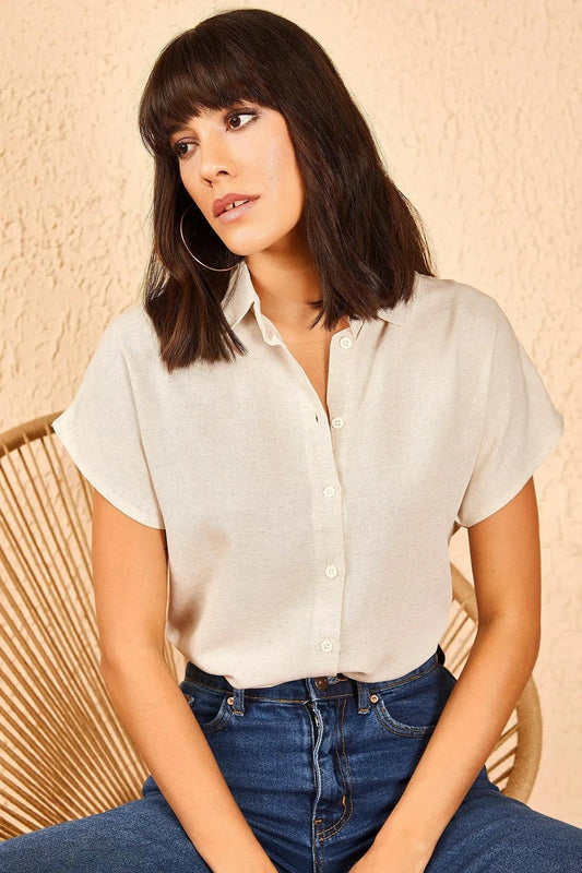 Camisa de lino fucsia de manga corta con botones